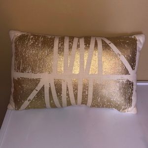 Gold throw pillow
